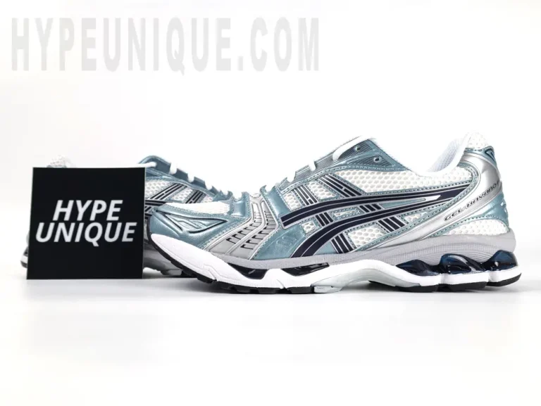 Front view of the ASICS Gel-Kayano 14 “Monaco Blue” alongside the Hypeunique brand logo.