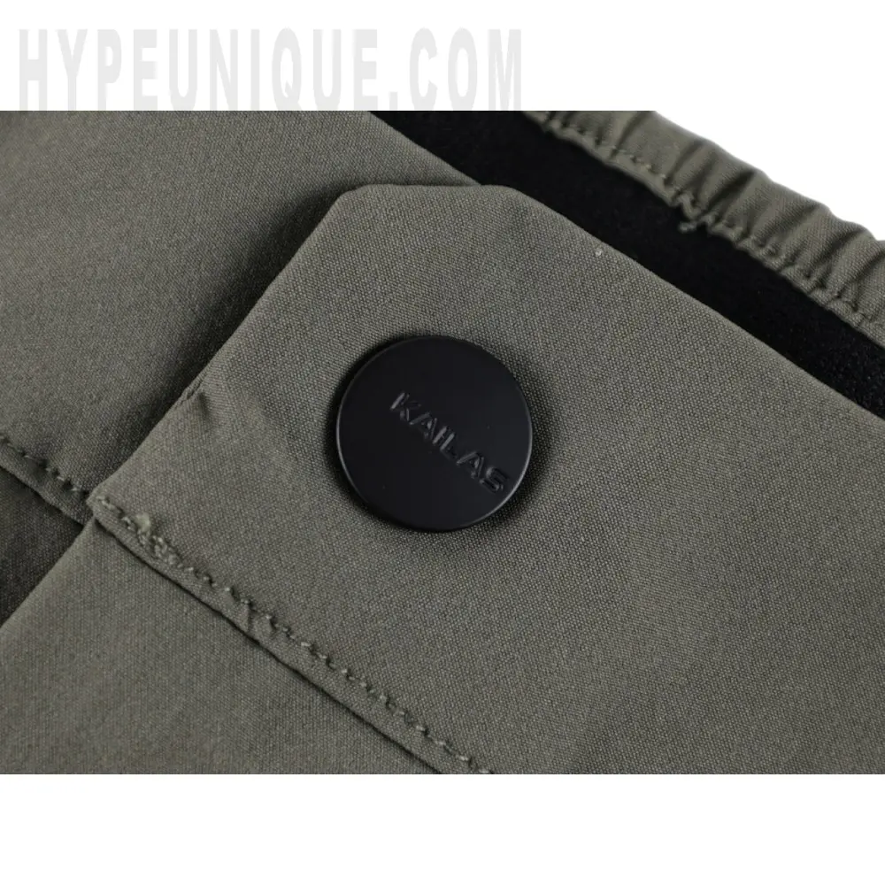 Close-up of button detail on the shorts