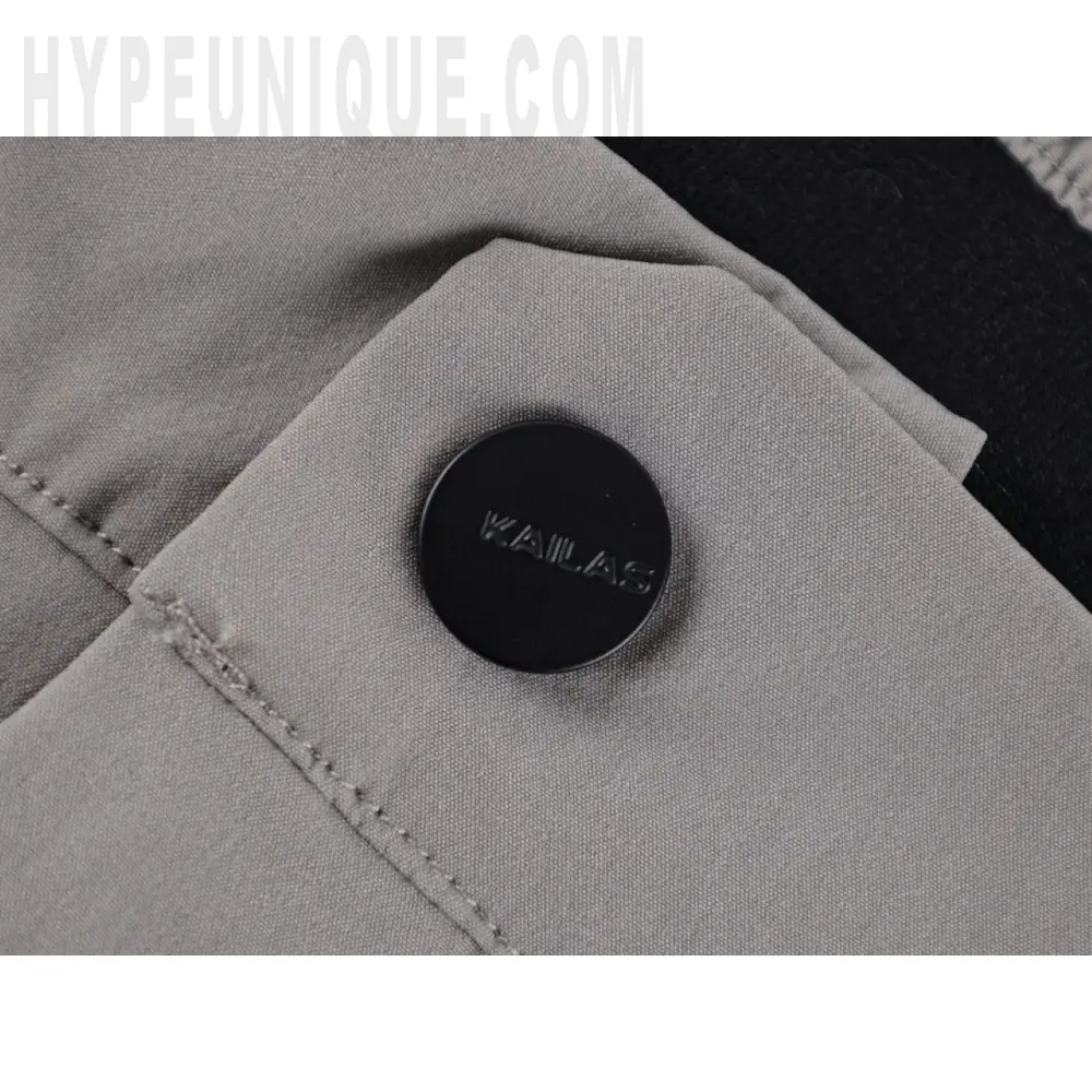 Close-up of button detail on the shorts