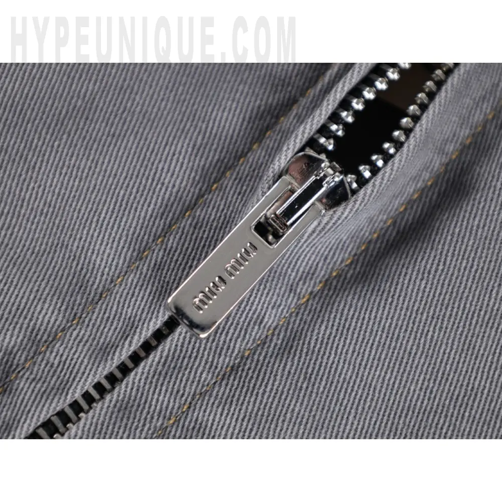 The zipper on the clothes