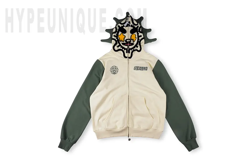 Front view of the Glomerica Full Zip Hoodie (Cream/Sage). Showing the unique hood and overall beige and green colorway.