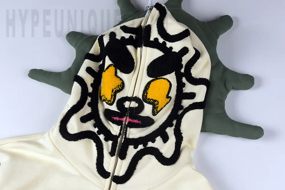 Hoodie with embroidered emojis