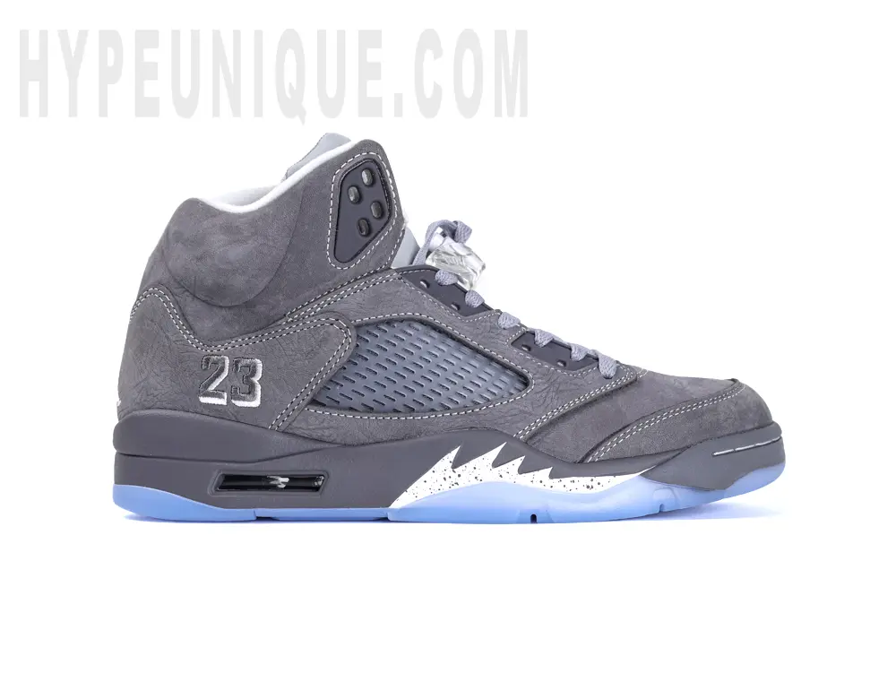Right medial side view of the Jordan 5 ‘Wolf Grey’, showcasing the grey suede upper and translucent blue icy outsole.