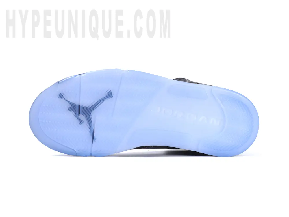 Bottom view of the Jordan 5 ‘Wolf Grey’, showcasing the translucent blue icy outsole.