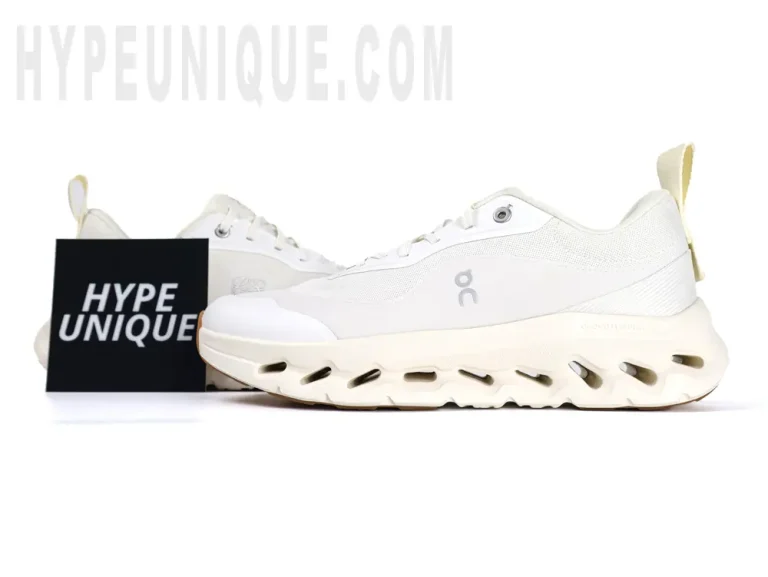 On Cloudtilt Loewe 2 ‘All White’ photographed alongside the Hypeunique logo