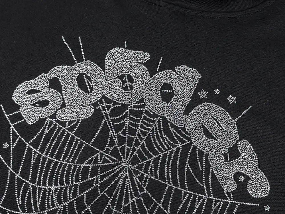 Detailed view of the diamond embellishment on the chest.