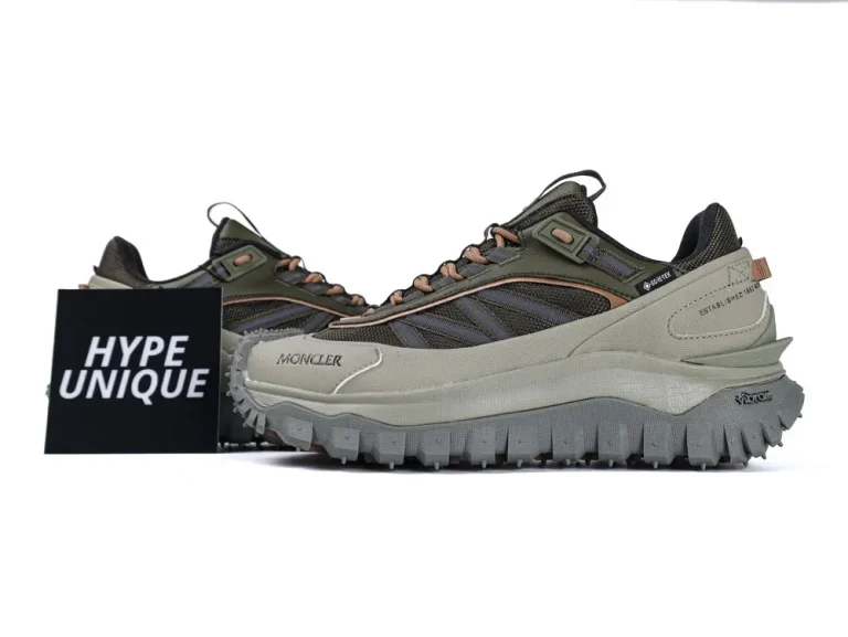 Green and beige sneakers featuring mesh and leather, rugged sole, angular design, with a prominent black “Hype Unique” sign.