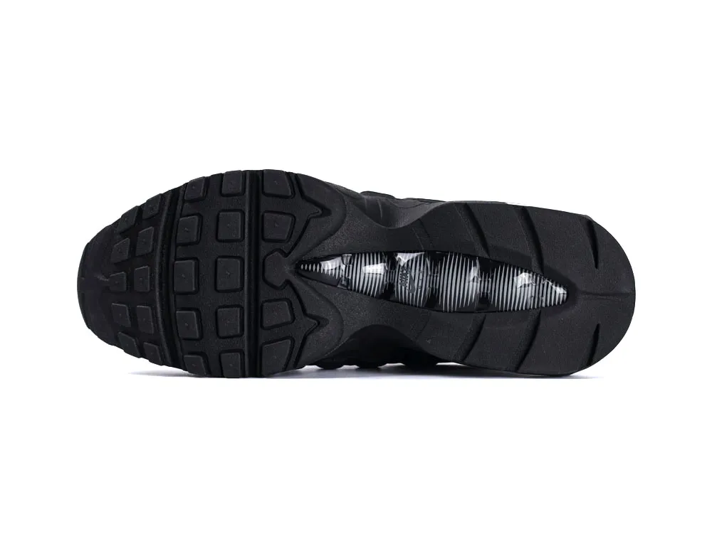 Black fabric shoe tongue with a label featuring size and manufacturing details.