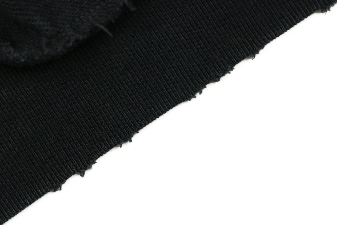 Black ribbed fabric cuff detail