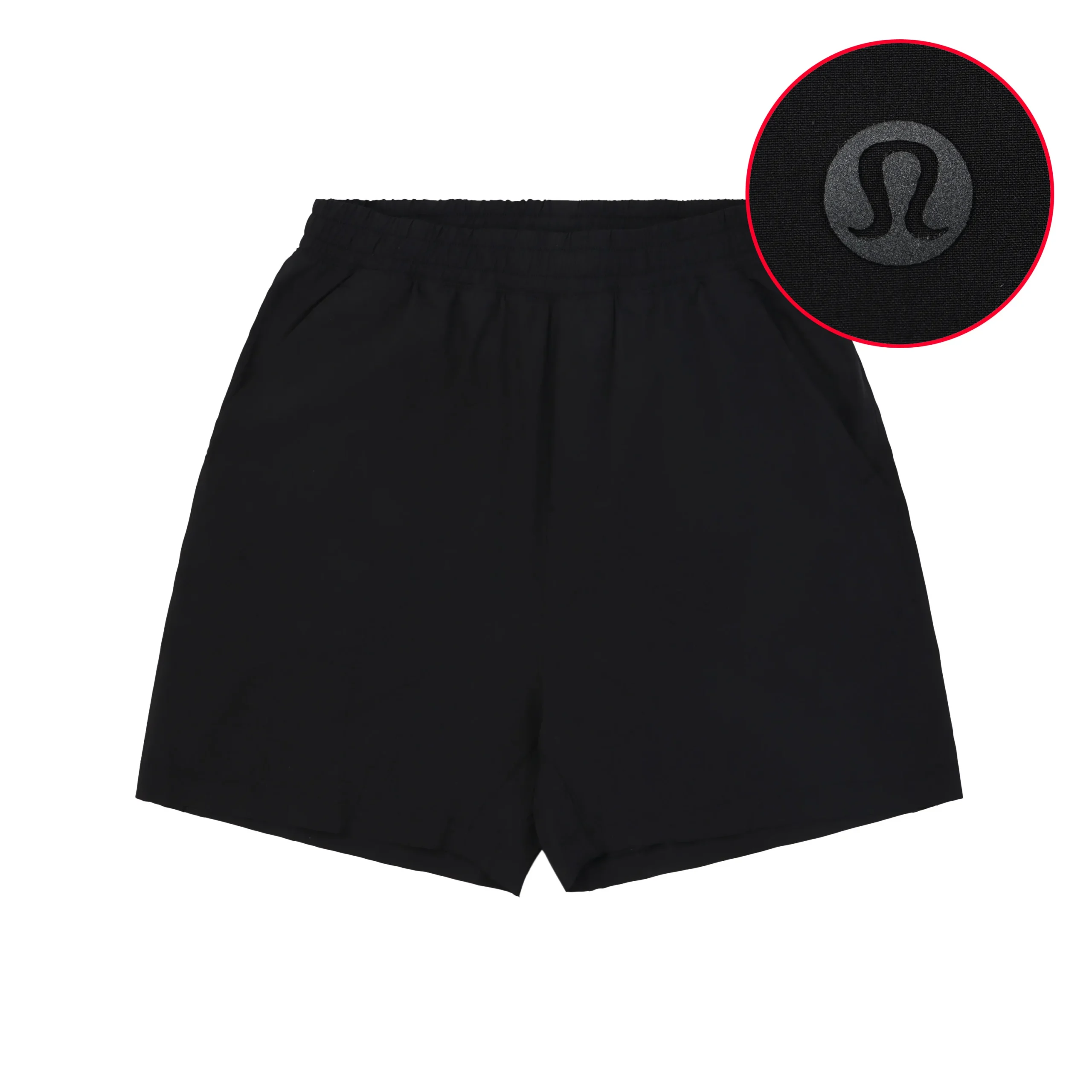 Black polyester shorts with elastic waistband and icon detail on fabric.