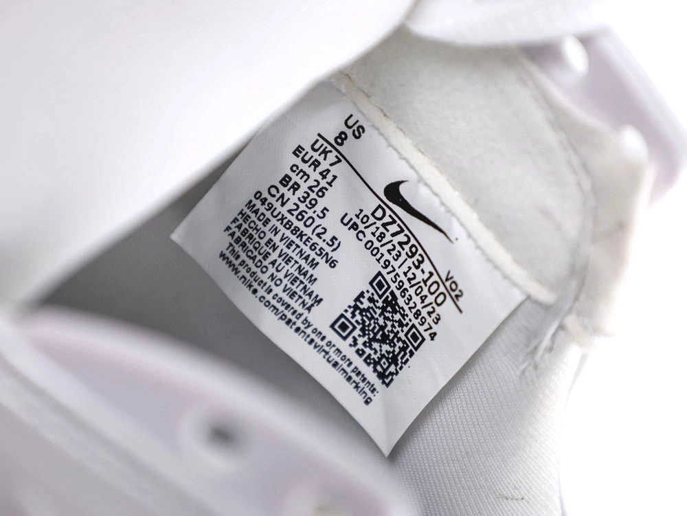 Side profile of sleek all-white sneakers showcasing wavy synthetic overlays and visible Air unit.