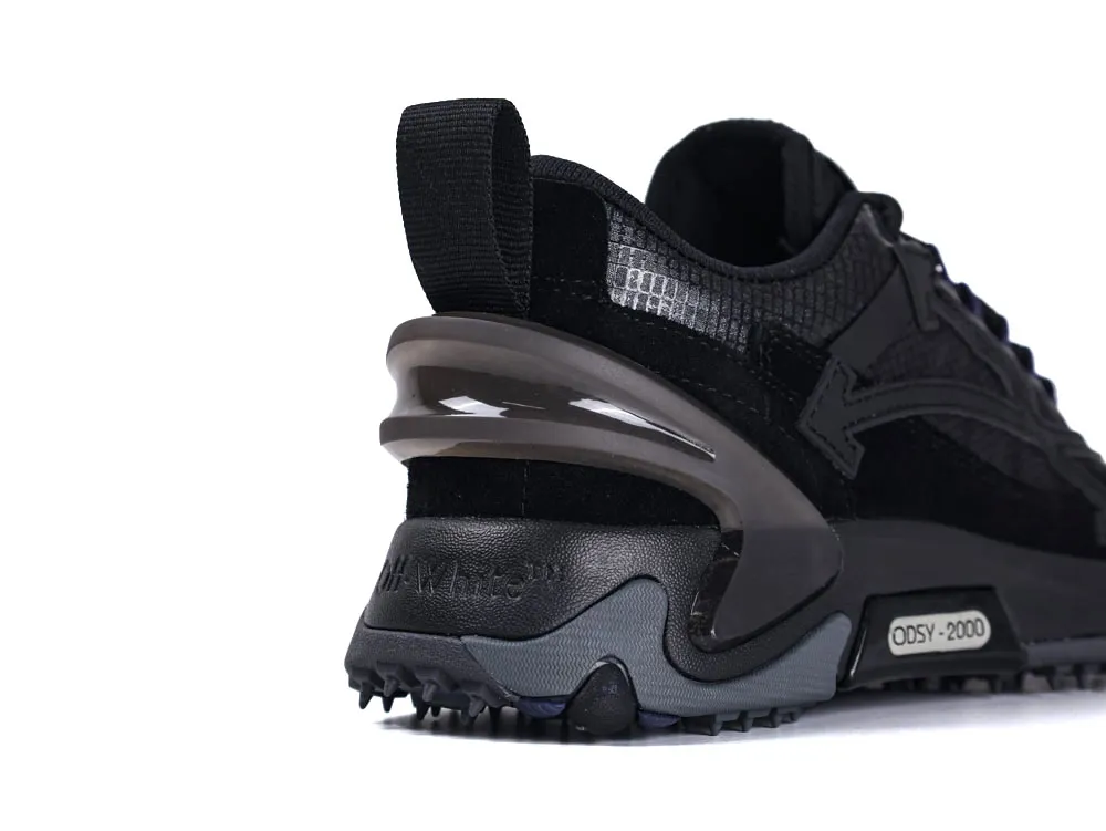 Black sneaker heel with a plastic support and rubber sole detailing.