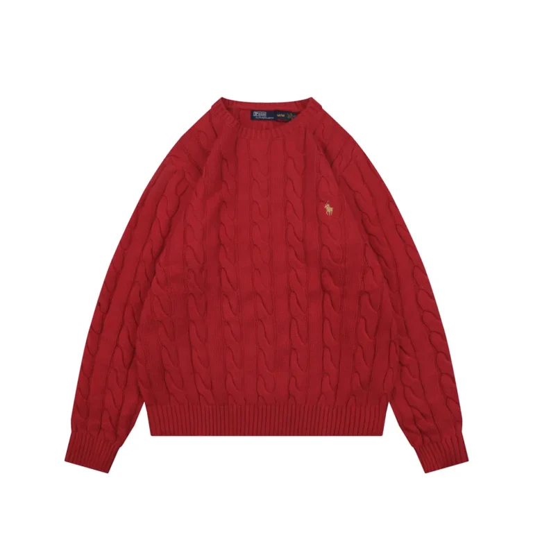 Red cable-knit sweater made of wool with ribbed cuffs and hem.