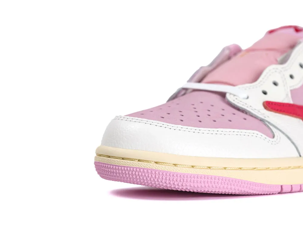White, pink, and red leather sneaker with perforated details and textured rubber sole.