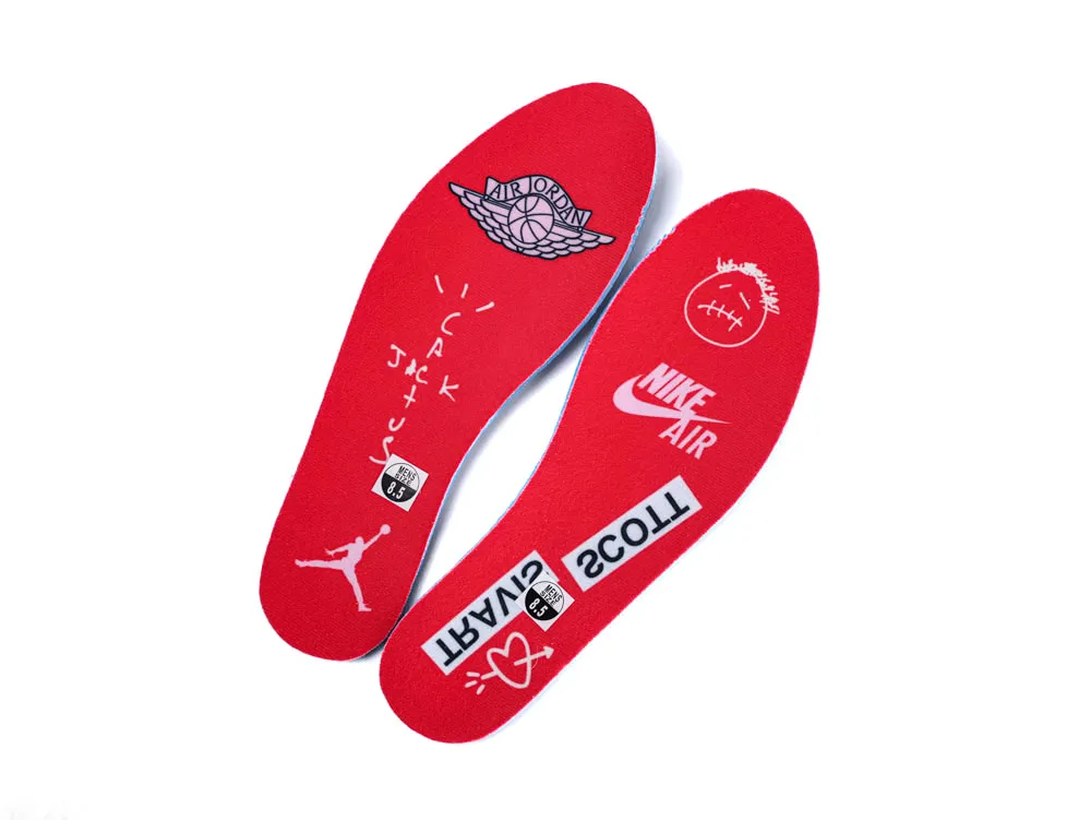 Red fabric insoles featuring logos and graphics, part of a shoe interior.