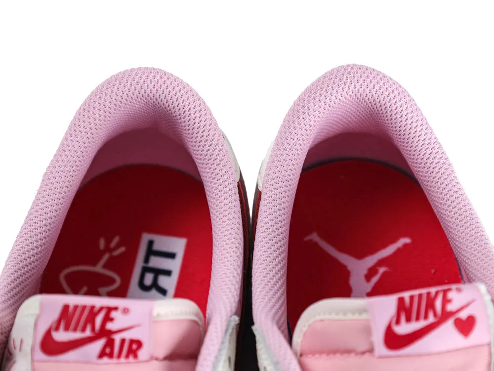Pink mesh sneaker collars with red insoles, featuring Nike Air branding.