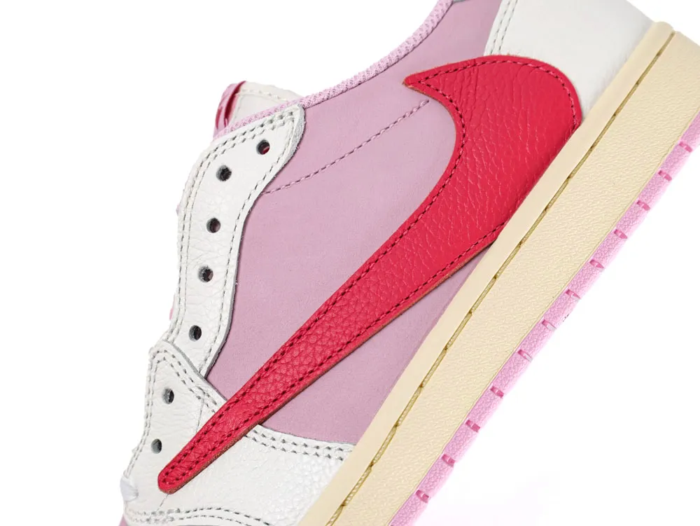 Pink and cream leather shoe with a red textured swoosh accent.
