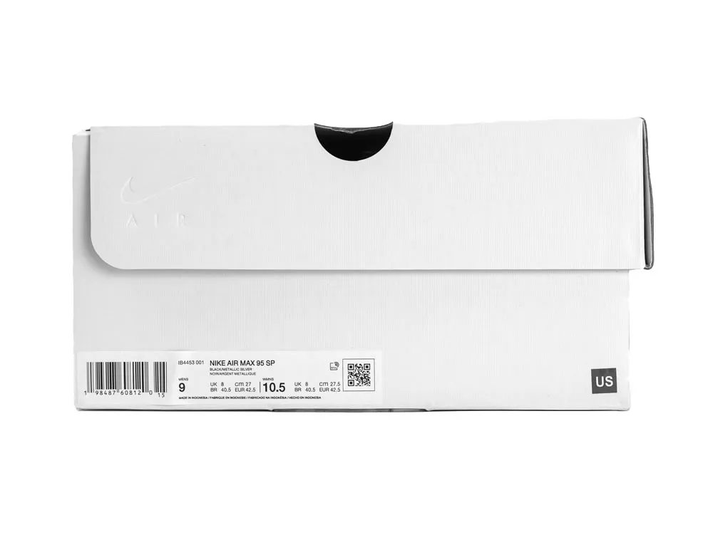 White cardboard shoe box with embossed logo and sizing label on the front.