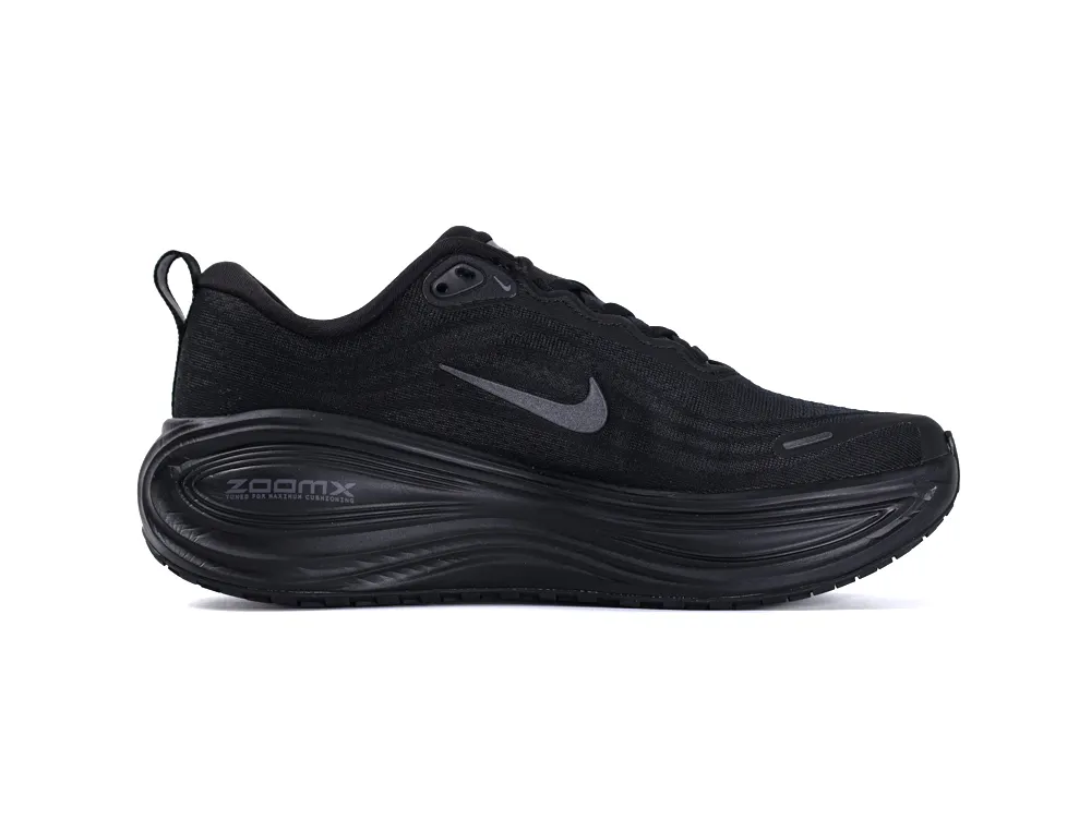 Black mesh sneaker with rubber sole and logo detail on the side.