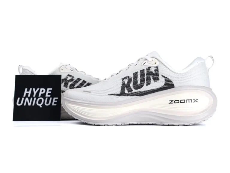 White mesh running shoe with black lettering and thick white ZoomX sole.