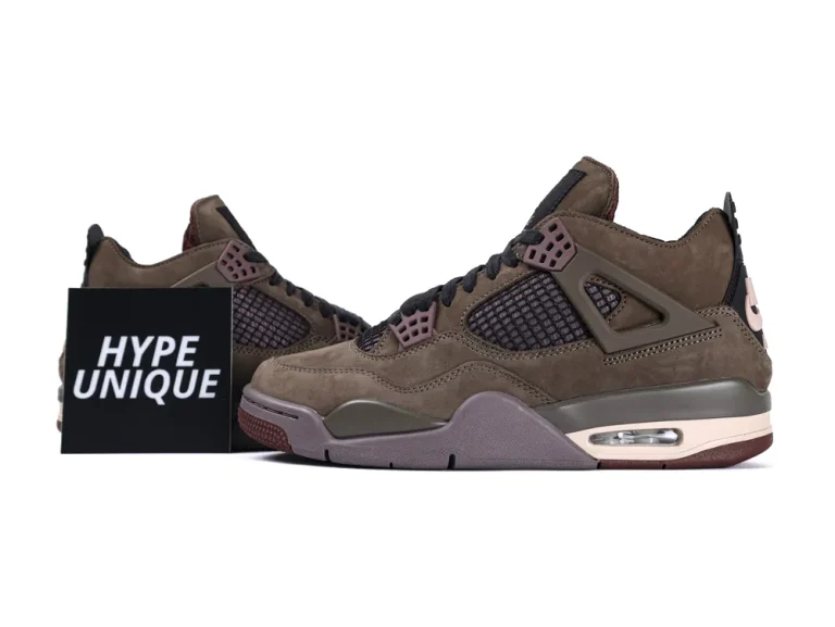 Brown suede sneakers with mesh panels and rubber soles, featuring a stylish design.