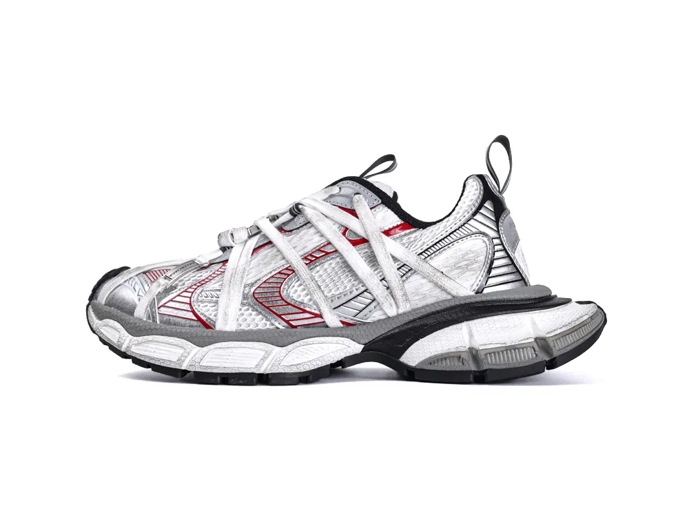 White and silver sneaker with mesh and synthetic materials, featuring black and red accents.