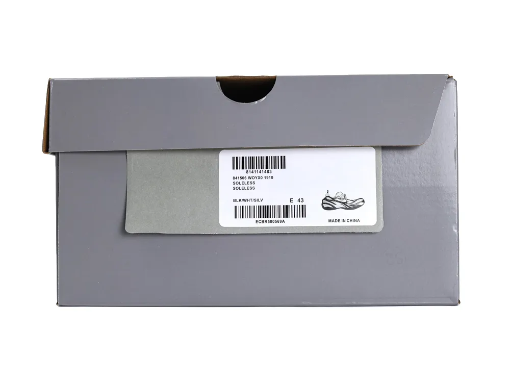 A grey cardboard shoe box with product label, displaying size and origin.