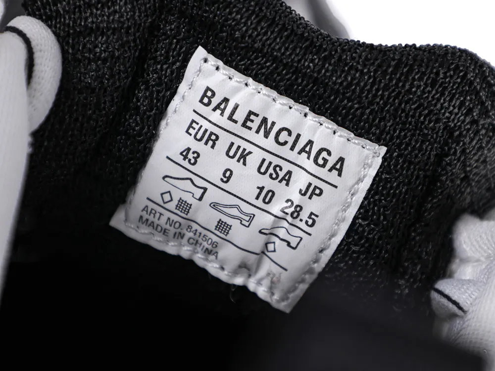 Label inside a black fabric shoe with size information and brand name.