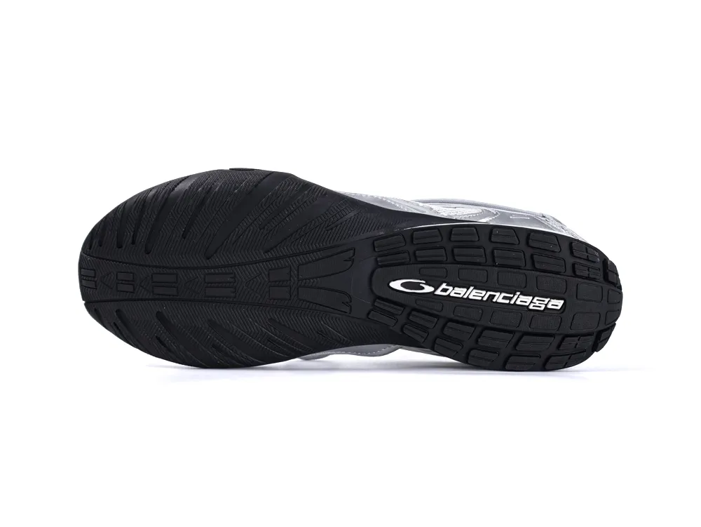 Black rubber sneaker sole with textured grip and white logo detailing.
