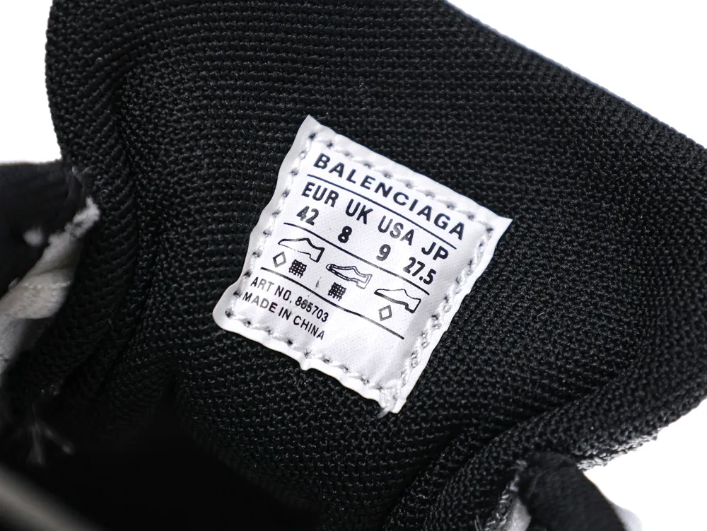 Black fabric shoe interior with a white label showing size and brand information.