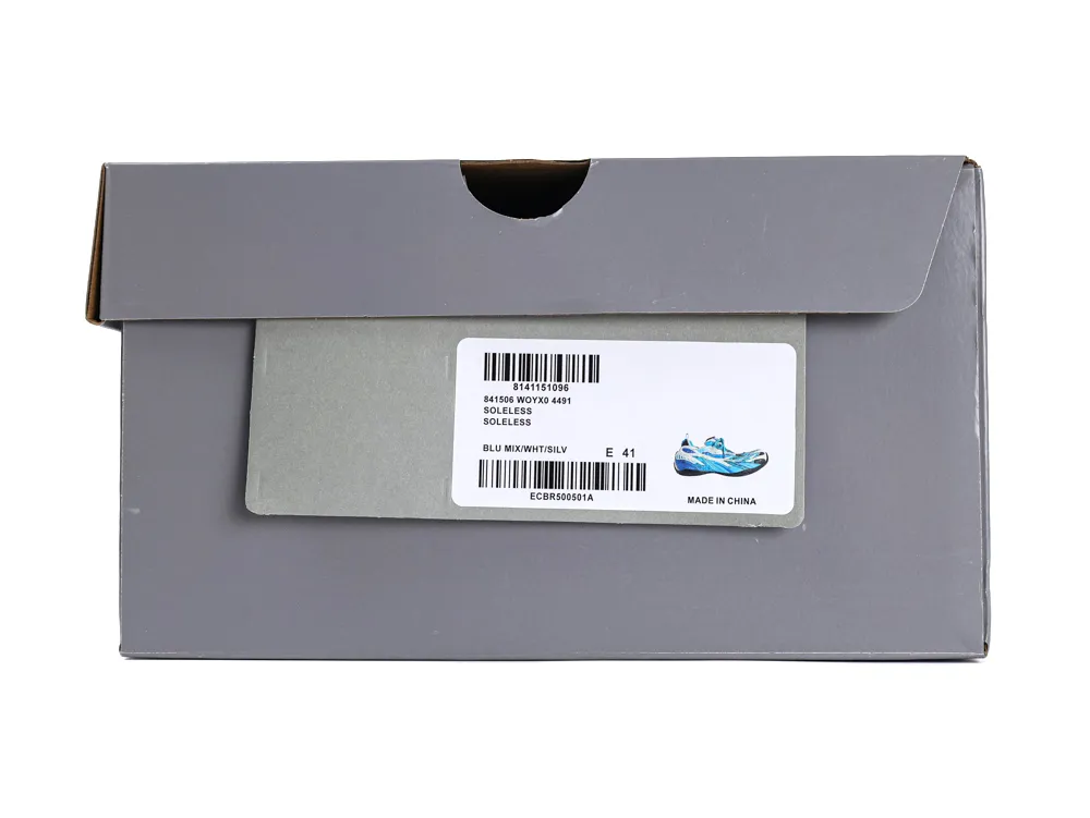 Gray cardboard shoe box with label showing blue and white shoes.