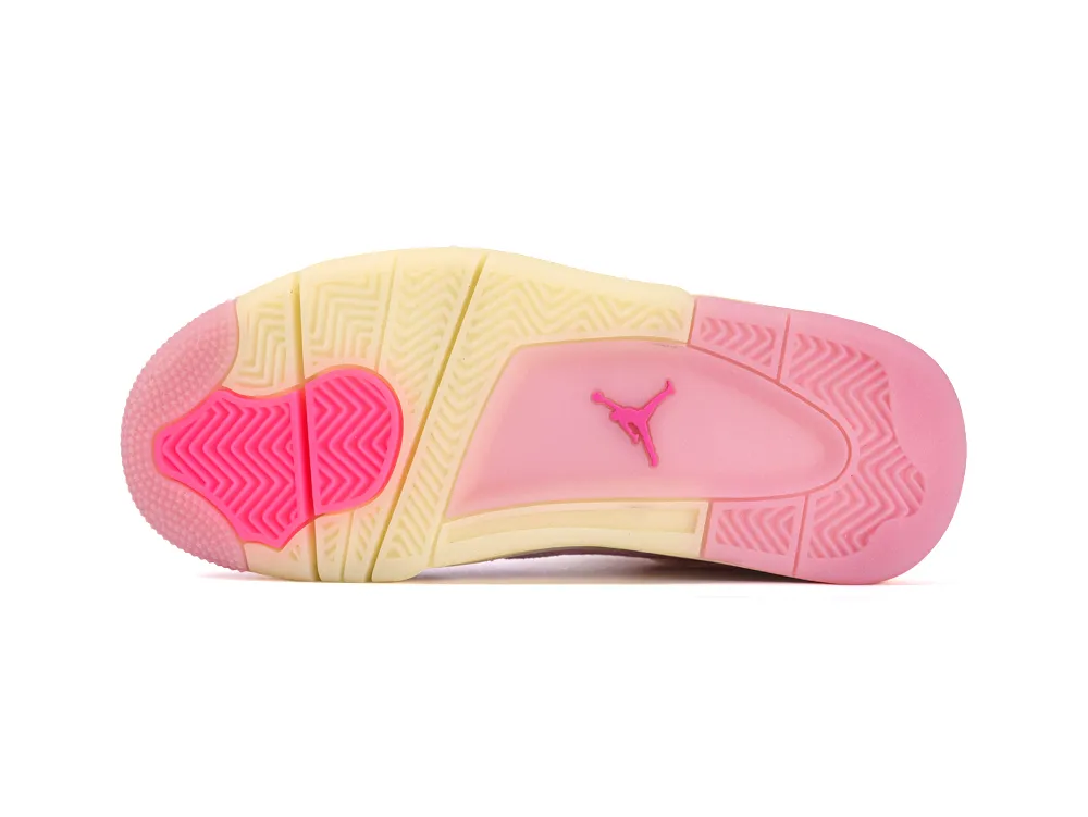 Pink and yellow rubber sneaker sole with textured patterns and logo.