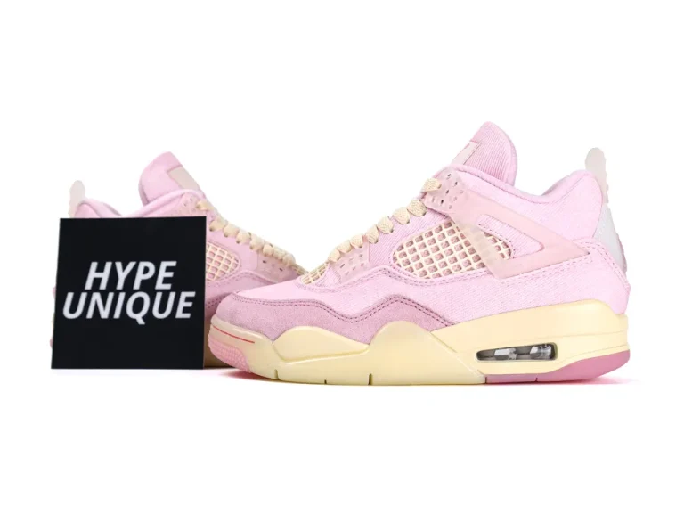 Pink fabric sneakers with textured mesh panels and cream rubber soles.
