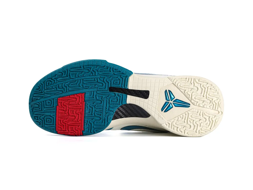 Multicolored rubber shoe sole with red, blue, and cream accents, featuring textured patterns.