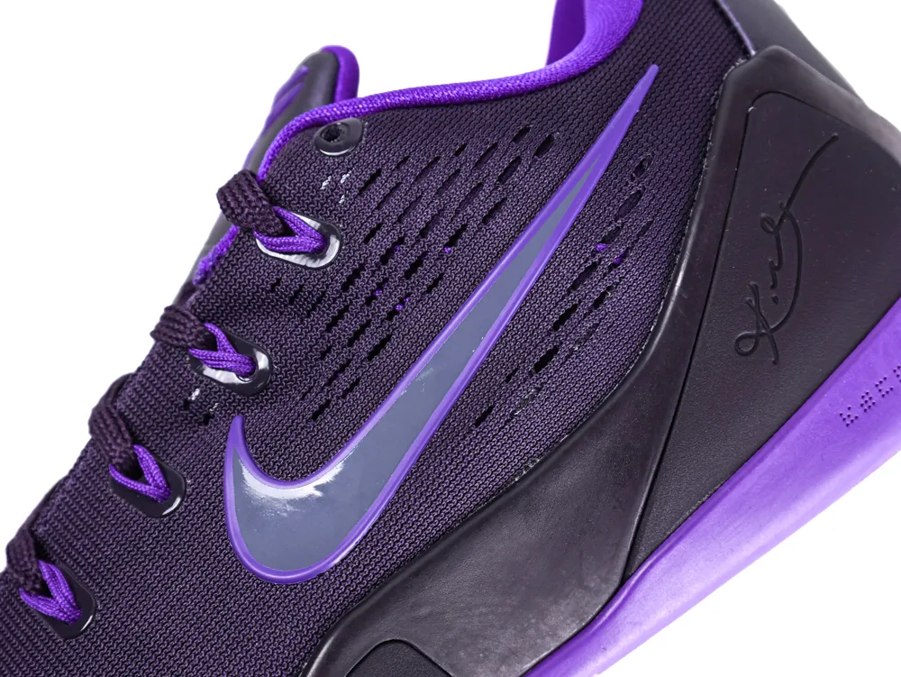 Purple and black mesh sneaker with synthetic sole and logo detail.