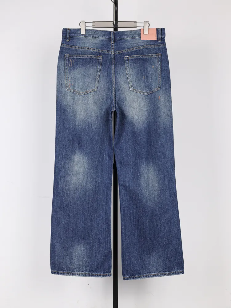 Back of Acne Dark Splatter Paint Washed Jeans