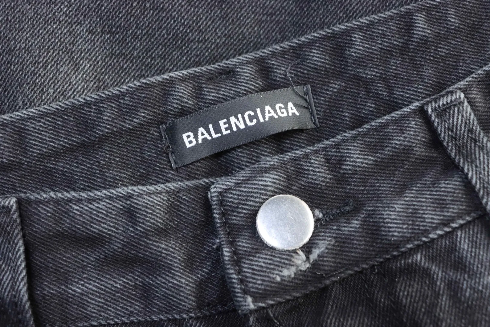 Button Details and Brand Tag
