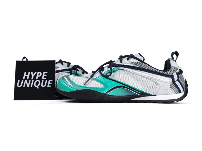 Lateral view of the Balenciaga Radar Sneaker in light grey, green, and black, displayed next to a "Hype Unique" card.