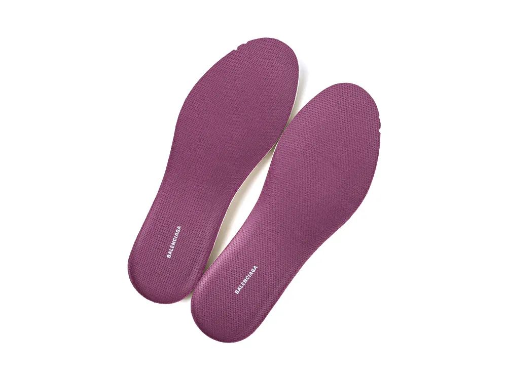 Pair of purple foam insoles with white Balenciaga branding for Radar sneakers.