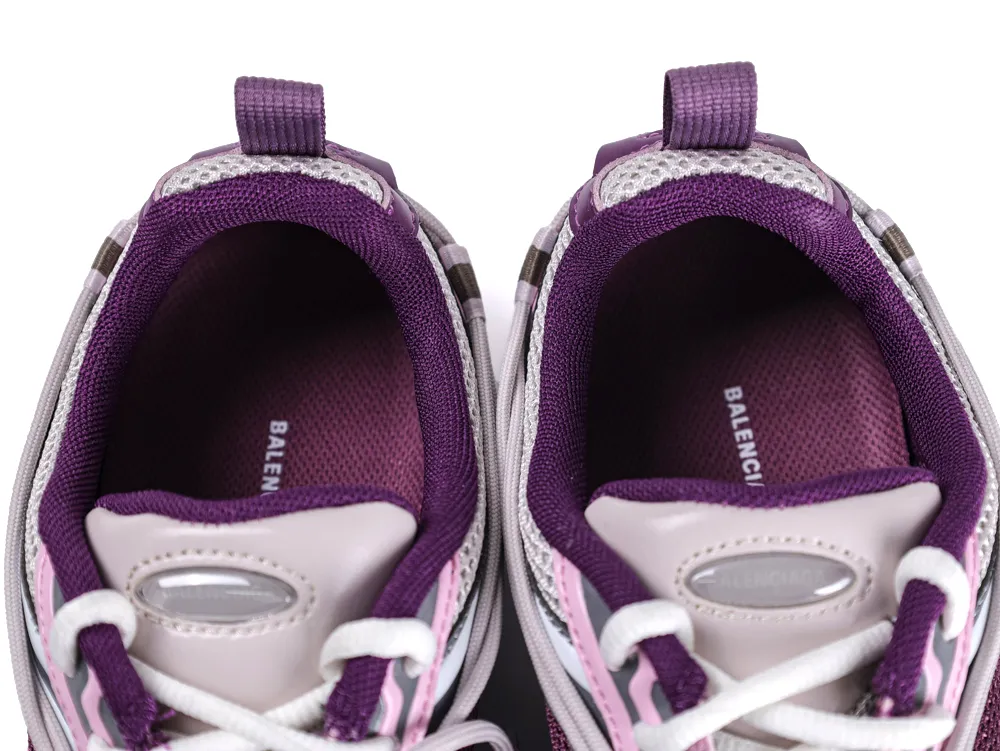 Top-down view of the Balenciaga Radar Sneaker interior showing the purple lining and white Balenciaga branding on the insoles.