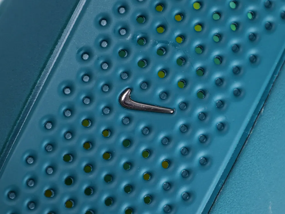 Lateral side view of Nike Mind 001 Geode Teal sneaker with black Swoosh