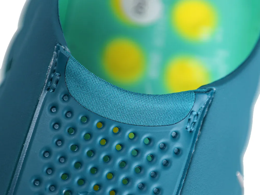 Interior view of Nike Mind 001 Geode Teal sneaker showing tongue and padding
