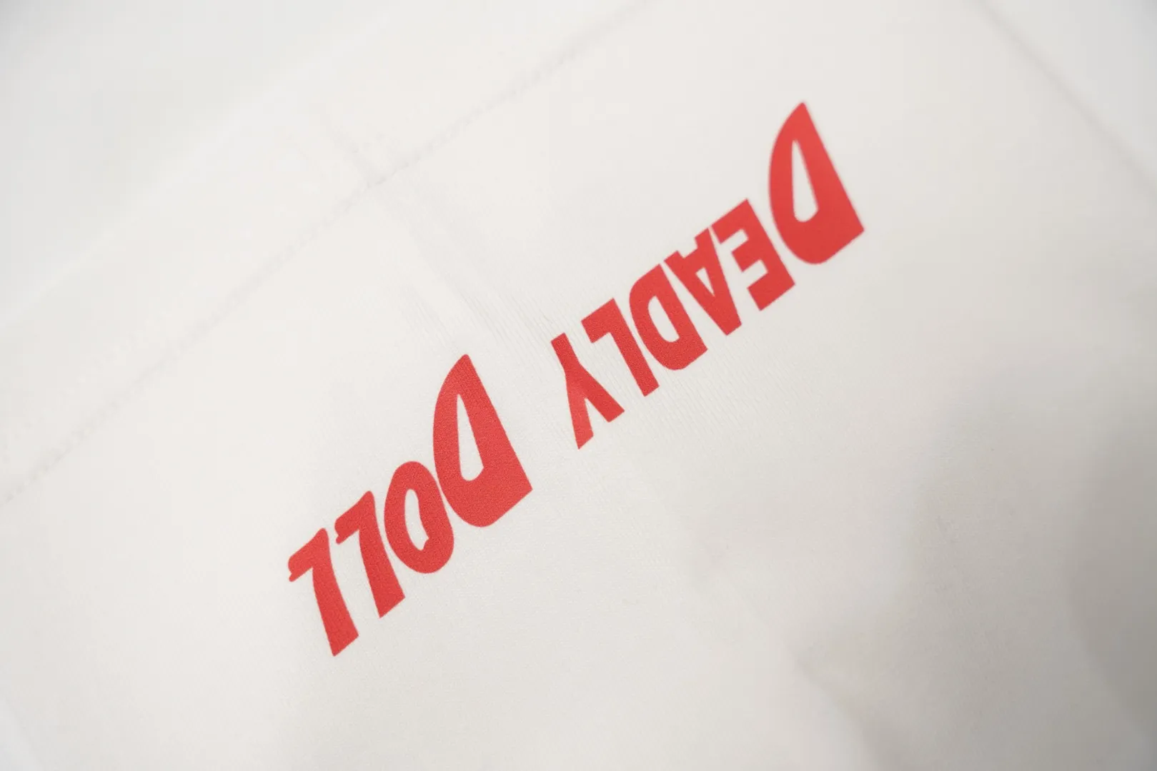 Deadly Doll Logo