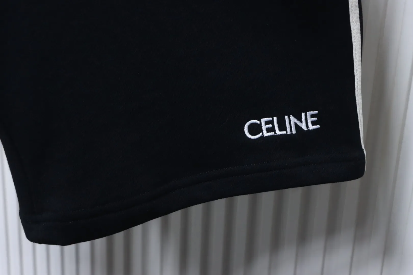Bottom Hem with Visible Logo