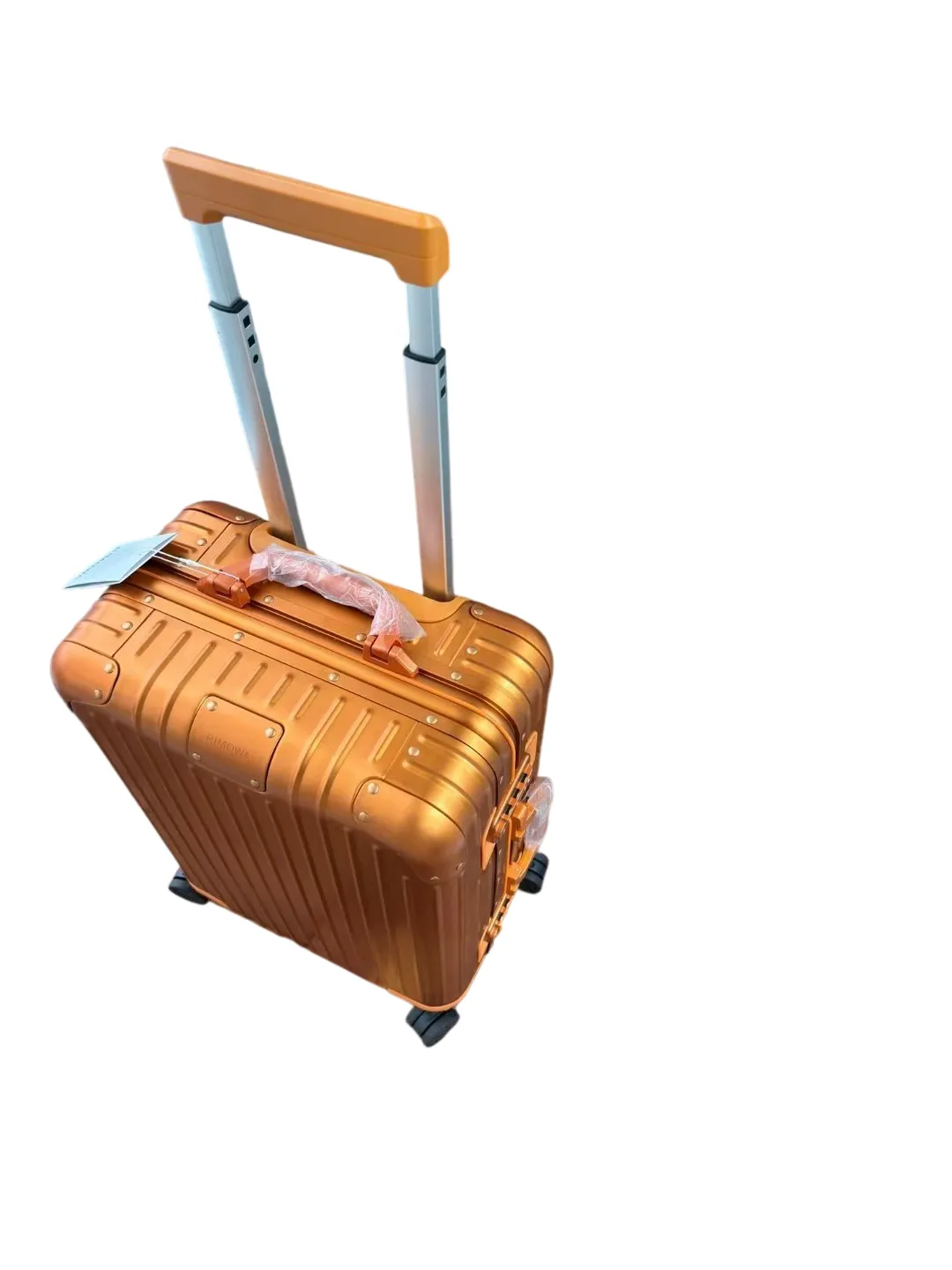 Orange luggage with extended handle