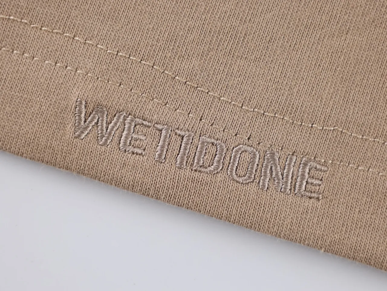 Bottom Hem Detail with Brand Logo
