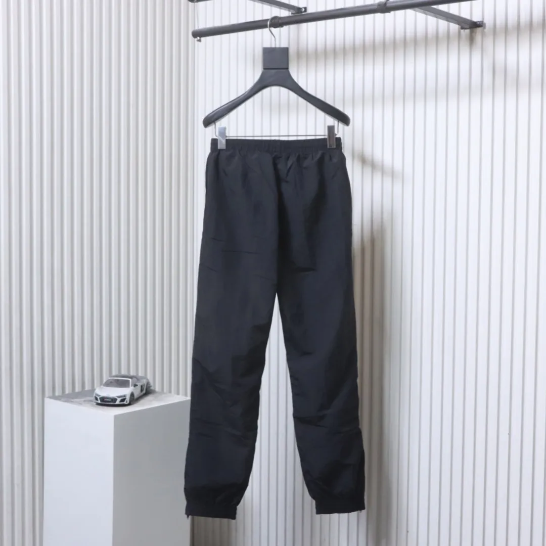 Back View BLCG Black Reverse Logo Zip-Hem Track Pants