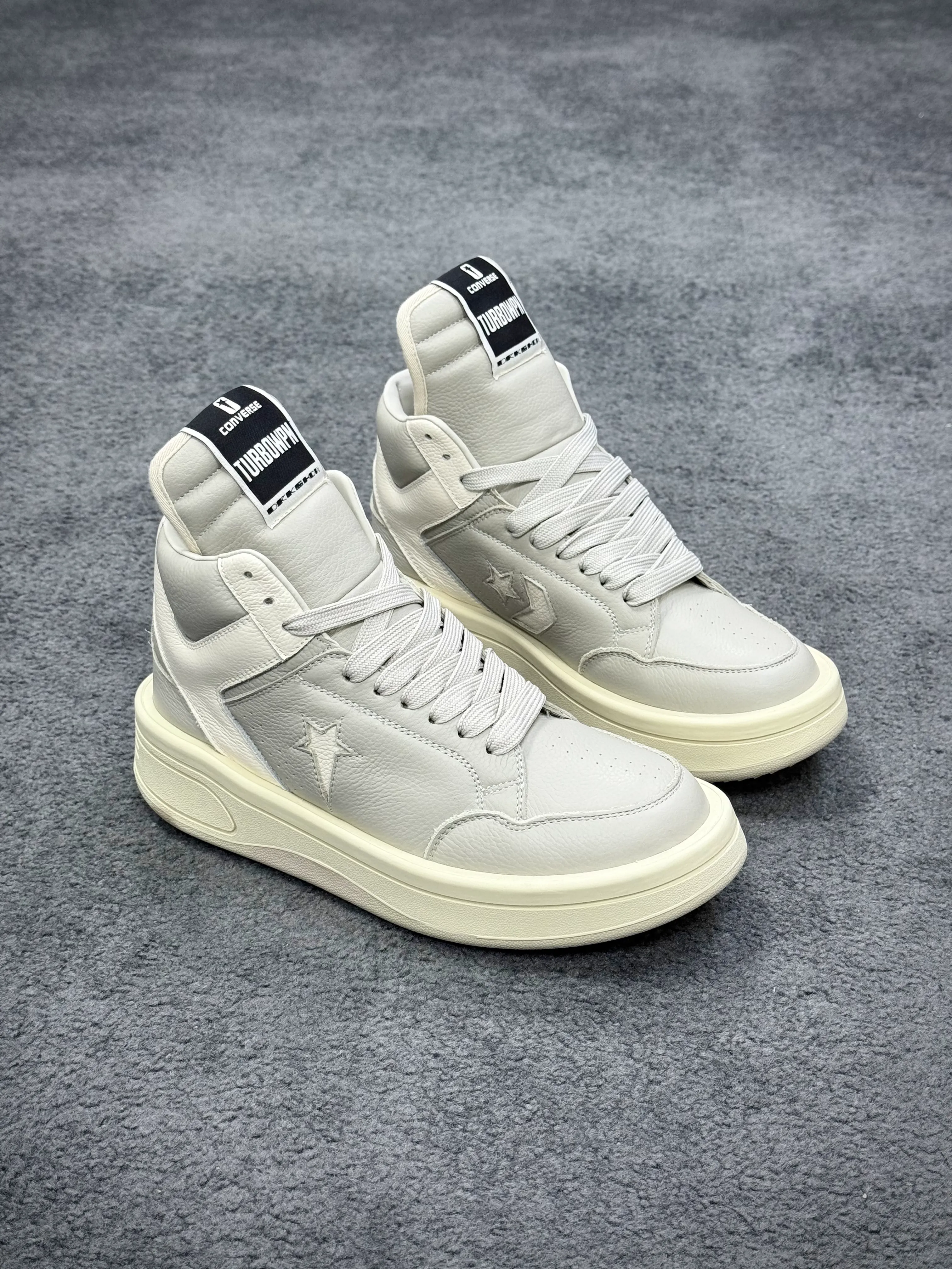 Cnvrs x R 0wens DRKSHDW TURBOWPN Mid Oyster White Angeled View
