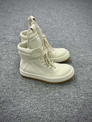 R 0wens Milk White Geobasket Leather High-Top Sneakers Angeled View