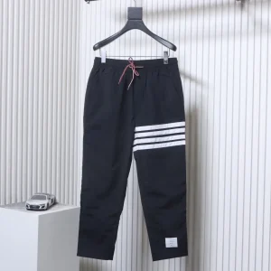 TB Four-Stripe Nylon Drawstring Pants